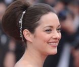 Marion Cotillard, sublime en Christian Dior Couture, assure la présentation du film De rouille et d'os, lors du festival de Cannes le 17 mai 2012