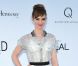 Louise Bourgoin en Louis Vuitton avec une minaudière Olympia Le-Tan à la soirée de l'amfAR, au Festival de Cannes le 24 mai 2012.