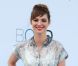 Louise Bourgoin en Louis Vuitton avec une minaudière Olympia Le-Tan à la soirée de l'amfAR, au Festival de Cannes le 24 mai 2012.