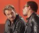 Johnny Hallyday et JoeyStarr, qui ont désormais le même manager, Sébastien Ferran, sur le plateau du  Grand Journal  de Canal+, le 6 juin 2012.