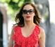 Rose McGowan, en rouge, fait du shopping dans les rues de Los Angeles, le 11 juillet 2012
