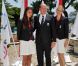 Albert et Charlene avec Angélique Trinquier, nageuse spécialiste du 100 m dos et porte-drapeau. Le prince Albert de Monaco et la princesse Charlene procédaient le 12 juillet 2012 à la présentation de la délégation olympique monégasque pour les JO de Londres 2012, à l'Hôtel Hermitage. Six athlètes porteront les couleurs de la principauté.