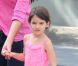 Katie Holmes et Suri Cruise sortent de l'animalerie Citipups à New York, le 15 juillet 2012