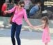 Katie Holmes et Suri Cruise sortent de l'animalerie Citipups à New York, le 15 juillet 2012