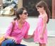 Katie Holmes et Suri Cruise sortent de l'animalerie Citipups à New York, le 15 juillet 2012