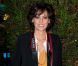 Inès de la Fressange, photographe stylée au Pavillon d'Armenonville pour le dixième Dîner de la Mode contre le sida. Paris, le 26 janvier 2012.