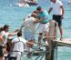  Elton John et son mari David Furnish arrivent au Club 55 de Saint-Tropez avec quelques amis le 13 août 2012 