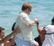 Elton John et son mari David Furnish arrivent au Club 55 de Saint-Tropez avec quelques amis le 13 août 2012 
