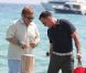  Elton John et son mari David Furnish arrivent au Club 55 de Saint-Tropez avec quelques amis le 13 août 2012 