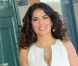 Salma Hayek pose devant la cabine de plage à son nom à Deauville, le 8 septembre 2012