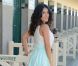 Salma Hayek pose devant la cabine de plage à son nom à Deauville, le 8 septembre 2012
