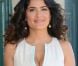 Salma Hayek pose devant la cabine de plage à son nom à Deauville, le 8 septembre 2012