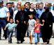Angelina Jolie, envoyée spéciale de l'agence pour les réfugiés des Nations unies, et le chef du Haut Commissariat, Antonio Guterres, visitent un camp de réfugiés syriens en Turquie le 13 septembre 2013