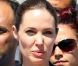 Angelina Jolie, envoyée spéciale de l'agence pour les réfugiés des Nations unies, et le chef du Haut Commissariat, Antonio Guterres, visitent un camp de réfugiés syriens en Turquie le 13 septembre 2013