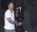 Megan Fox et Brian Austin Green dissimulés derrière un parapluie, à Los Angeles, le 23 septembre 2012.