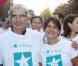 Raymond Domenech et Estelle Denis lors de la 10e édition de de la course Odyssea au profit de de la lutte contre le cancer du sein au château de Vincennes le 7 Octobre 2012