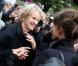 La femme de Claude Pinoteau, Birte et Sophie Marceau lors des funérailles du réalisateur Claude Pinoteau à Paris le 11 octobre 2012