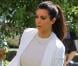 Kim Kardashian, maîtresse irréprochable de Mercy, son chat qu'elle emmène chez Orange Grooming pour une petite séance de soins. Miami, le 15 octobre 2012.