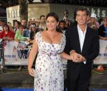 Pierce Brosnan et sa femme à l'avant-premièrede Mama Mia, à LOndres, le 30/06/08
