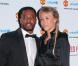 Patrice Evra et sa femme Sandra amoureux lors du gala de l'UNICEF organisé par l'équipe de Manchester United à Manchester le 19 décembre 2012