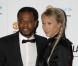 Patrice Evra et sa femme Sandra  lors du gala de l'UNICEF organisé par l'équipe de Manchester United à Manchester le 19 décembre 2012 