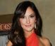 Minka Kelly participe au défilé Red Dress Collection 2013 de la National Institutes of Health et de son programme The Hearth Truth au Hammerstein Ballroom. New York, le 6 février 2013.