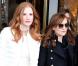 Jessica Chastain et Isabelle Huppert quittent l'hôtel Le Meurice pour rejoindre l'Espace Vendôme et assister au défilé Moncler Gamme Rouge automne-hiver 2013. Paris, le 6 mars 2013.