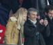 Nagui et sa femme Mélanie Page pendant le match Paris Saint-Germain - FC Barcelone au Parc des Princes, le 2 avril 2013.