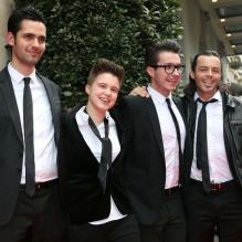 Les quatre finalistes de l'émission The Voice 2, Nuno Resende, Olympe, Loïs et Yoann Fréget aux côtés de Nikos Aliagas, lors du Global Gift Gala à l'initiative d'Eva Longoria, à l'hôtel George V à Paris, le 13 mai 2013