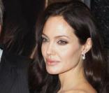 Clint Eastwood regarde bizarrement... Angelina Jolie !