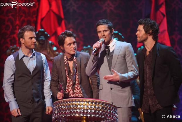 Les Take That : Gary Barlow, Mark Owen, Jason Orange, Howard Donald