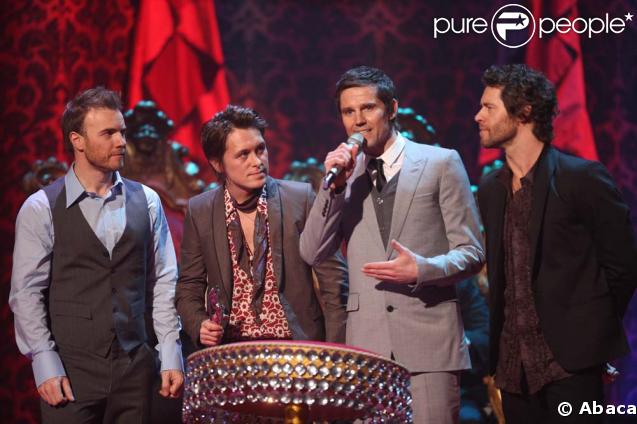 Les Take That : Gary Barlow, Mark Owen, Jason Orange, Howard Donald