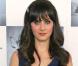 L'adorable Zooey Deschanel avait même prévu le noeud papillon... ben oui, c'était une soirée habillée !