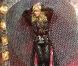 Britney Spears sur scène en 2001. Une tenue pleine de paillettes pour un maximum d'effet.