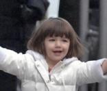 Katie Holmes à New York avec Tom Cruise et leur fille Suri en décembre 2008