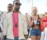 Amber Rose, super sexy en brassière blanche et mini-mini-short en jean, a accompagné Kanye West durant toute la Fashion Week parisienne, qui s'est tenue début mars 2009 !