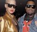 Amber Rose, dans sa superbe veste dorée, a accompagné Kanye West durant toute la Fashion Week parisienne, qui s'est tenue début mars 2009 !