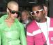 Amber Rose, arborant une petite veste en cuir vert pomme et une jupe droite noire, a accompagné Kanye West durant toute la Fashion Week parisienne, qui s'est tenue début mars 2009 !