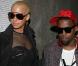Amber Rose, ou la sexy attitude à son paroxysme dans cette robe courte et transparente. La géante des podiums a accompagné Kanye West durant toute la Fashion Week parisienne, qui s'est tenue début mars 2009 !