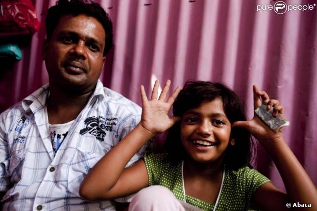 Rubina, son papa Rafiq et sa belle-mère Munni.