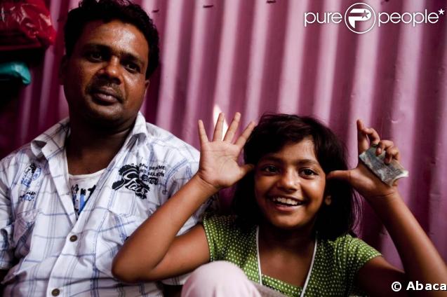 Rubina, son papa Rafiq et sa belle-mère Munni.