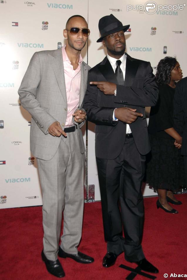 Le rappeur Swizz Beats au côté de Wyclef Jean  