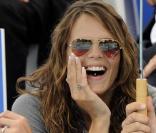 Laure Manaudou : une jeune femme amoureuse et souriante... qui encourage son chéri plus que jamais !