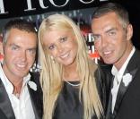 Tara Reid, entourée de Dean et Dan Caten, à l'occasion de la soirée DSquared, qui s'est tenue au VIP Room de Saint-Tropez, le 25 juillet 2009 !