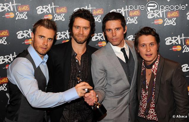 Le groupe Take That : Gary Barlow, Howard Donald, Jason Orange et Mark Owen, en février 2008