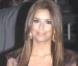 Eva Longoria dans sa jolie robe marron arrive au show de Jimmy Kimmel