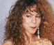 Mariah Carey à ses débuts avec sa crinière frisée