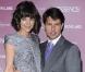 Tom Cruise et Katie Holmes sont tellement ressemblants qu'ils en deviennent presque... flippants ! Ils marchent ensemble, rient ensemble, et s'habillent dans les mêmes tons. Un couple très... robotique !