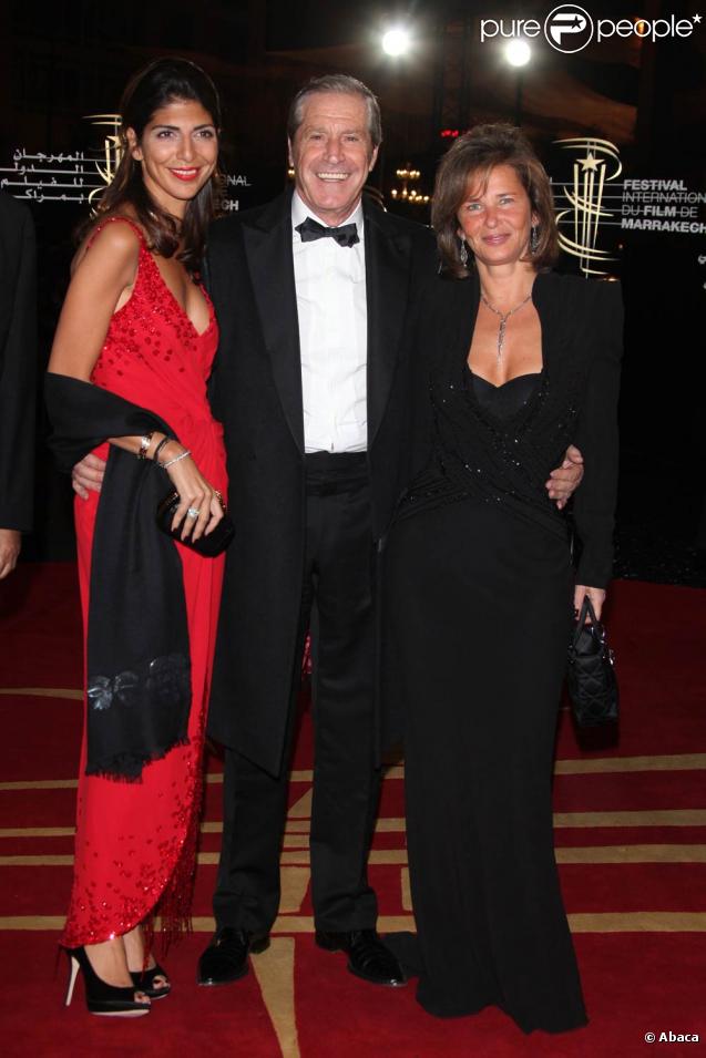 Jean-Claude Darmon et sa charmante compagne Hoda Roche, à l'occasion de l'ouverture du 9e Festival International du Film de Marrakech, au Maroc, le 4 décembre 2009.