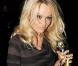 La torride Pamela Anderson à la sortie d'une représentation... a encore des forces pour la fête !